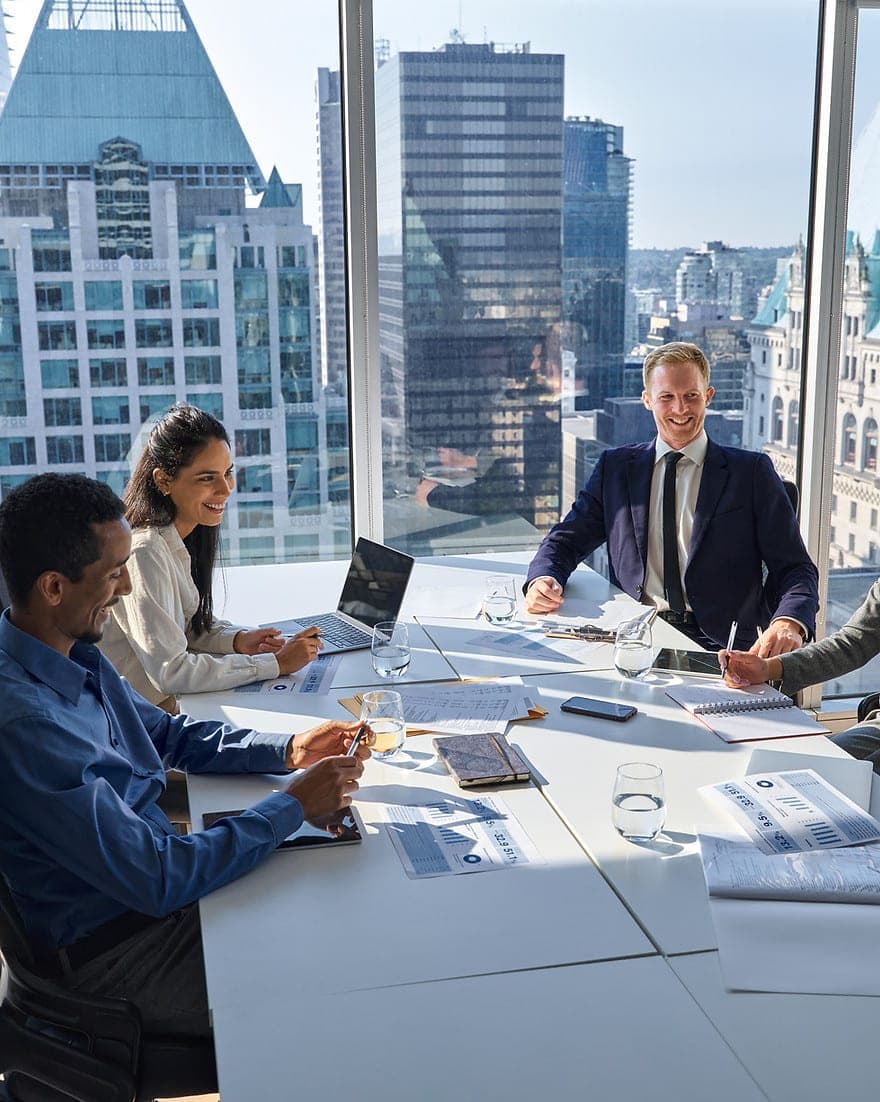 Legal professionals in discussion in a law firm meeting room