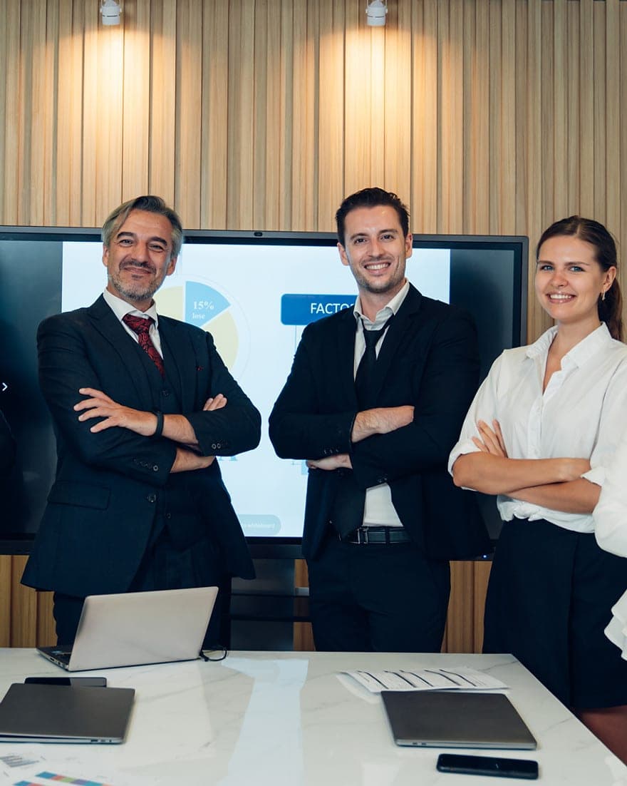 Technology leaders in discussion in a modern office